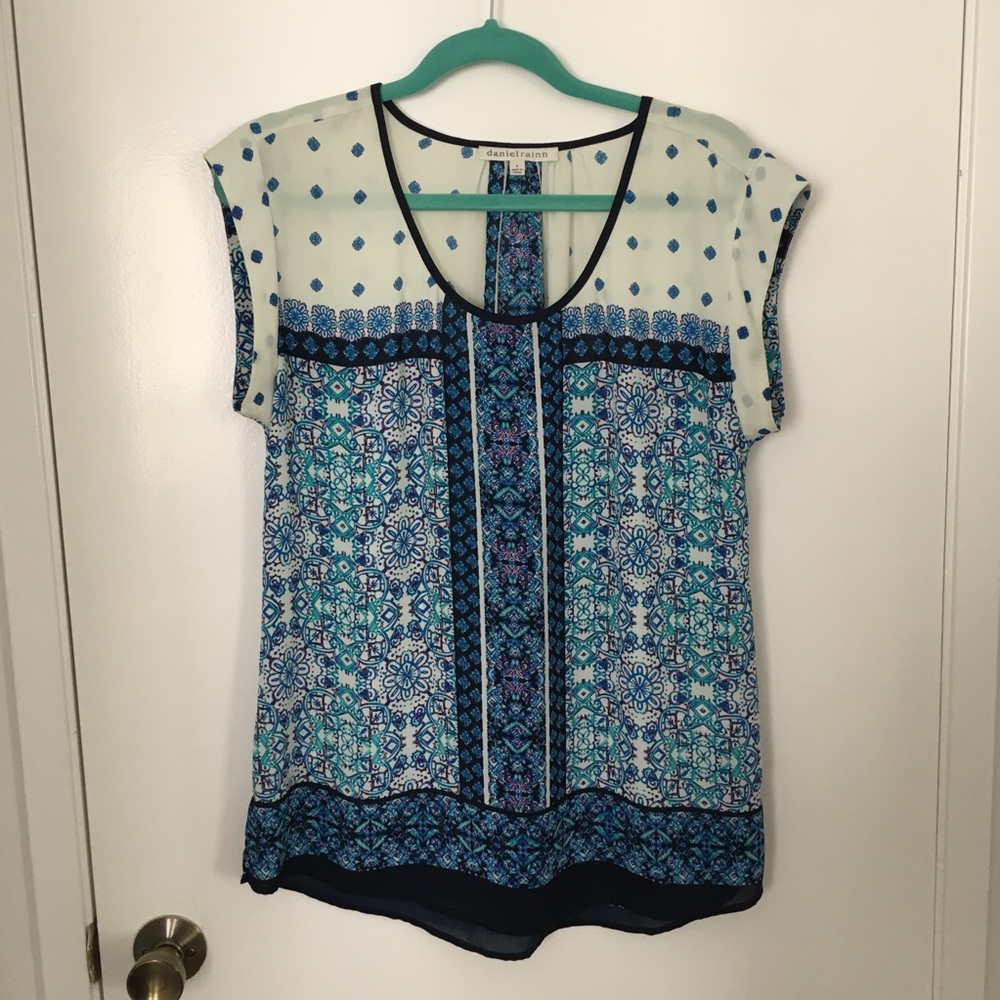 Blue and white patterned blouse